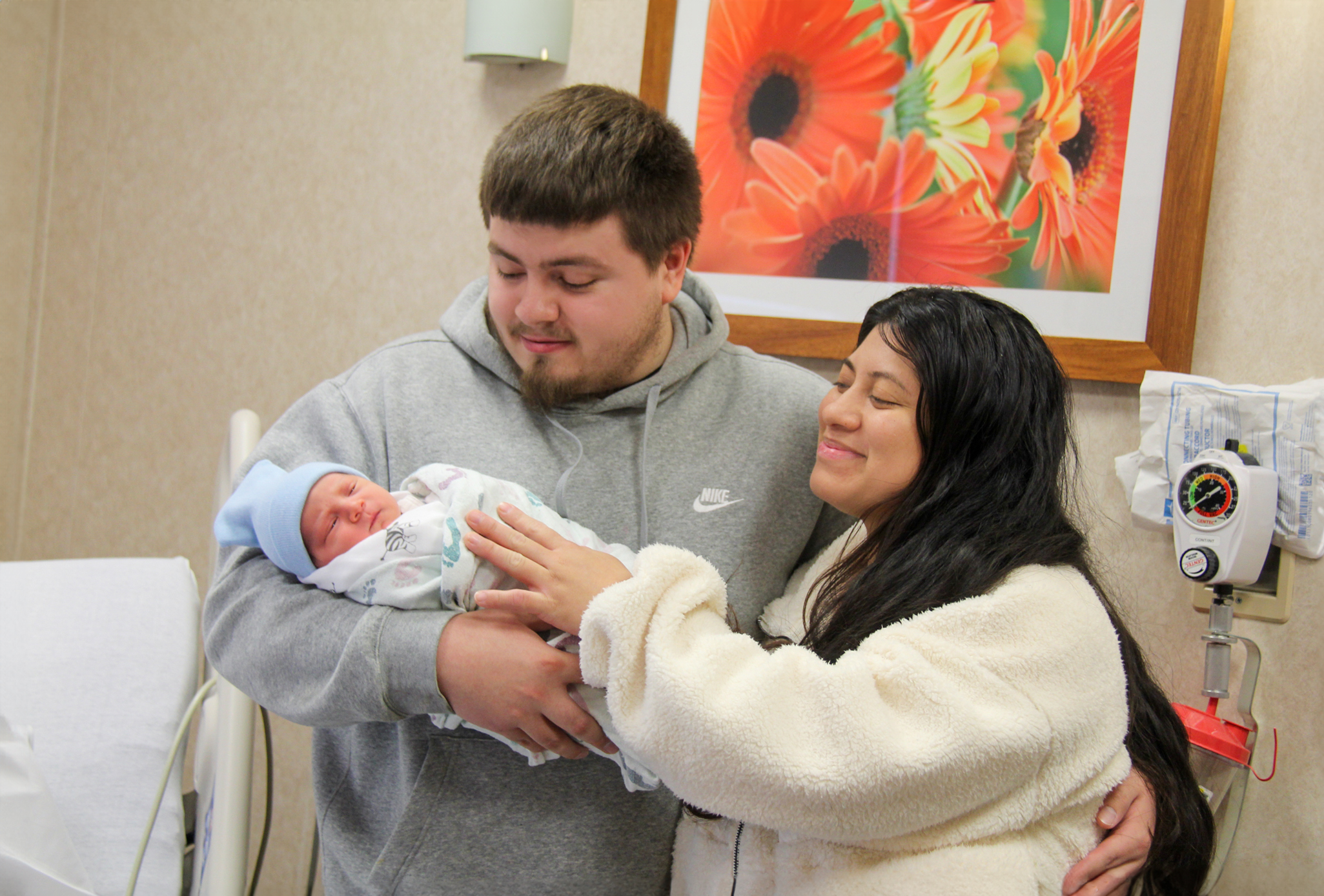 Dad Daiten and mom Cindy look lovingly at their New Year’s baby boy, Armani Mateo.